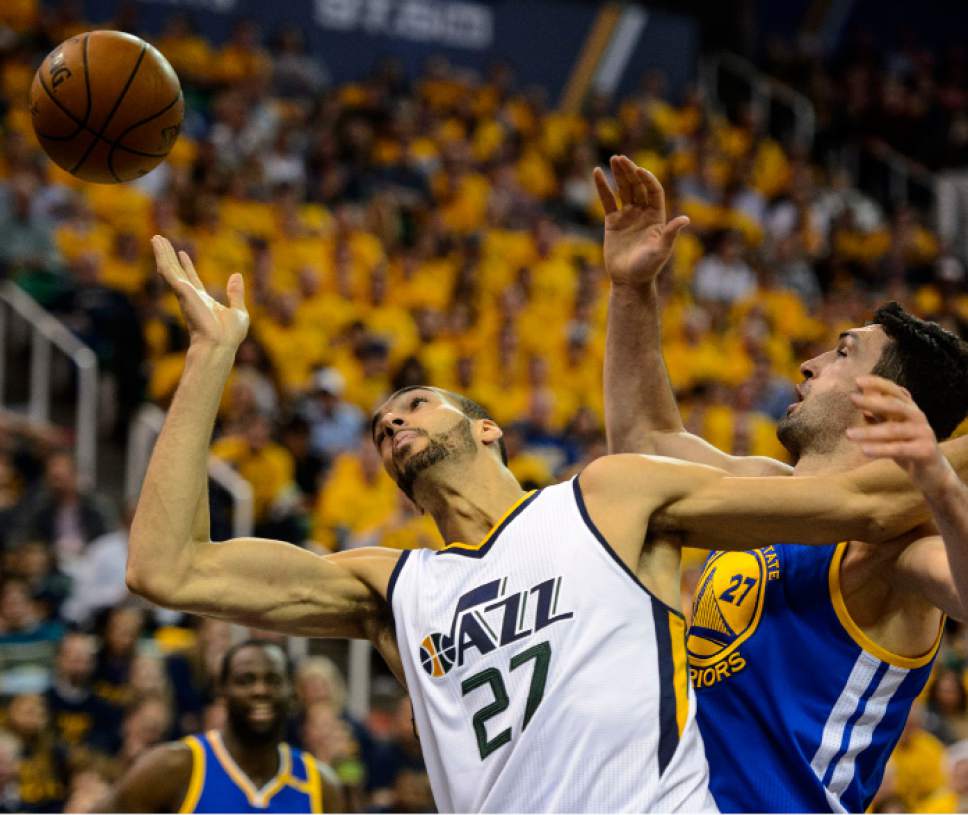 Steve Griffin  |  The Salt Lake Tribune


Utah Jazz center Rudy Gobert (27) tips the ball to himself in front of Golden State Warriors center Zaza Pachulia (27) during game 4 of the NBA playoff game between the Utah Jazz and the Golden State Warriors at Vivint Smart Home Arena in Salt Lake City Monday May 8, 2017.