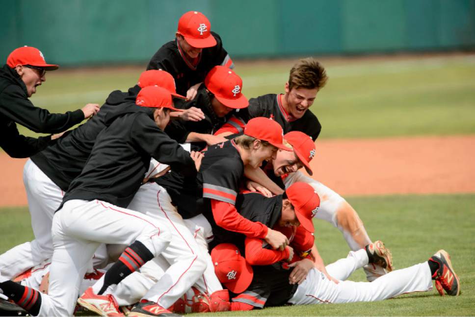 Steve Griffin  |  The Salt Lake Tribune



Park City's Benjamin Agnew is attacked by his teammates after he smacked a walk-off double giving the Minters a victory over Pine View in the class 3A baseball state playoff game at UVU in Orem Thursday May 18, 2017.