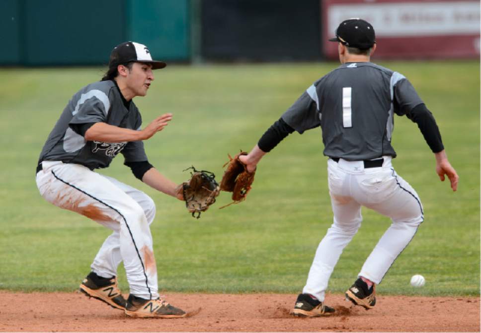 Steve Griffin  |  The Salt Lake Tribune



The ball finds its way between Pine View's Erik Sanchez and Kory Taigan during the class 3A baseball state playoff game against Park City at UVU in Orem Thursday May 18, 2017.