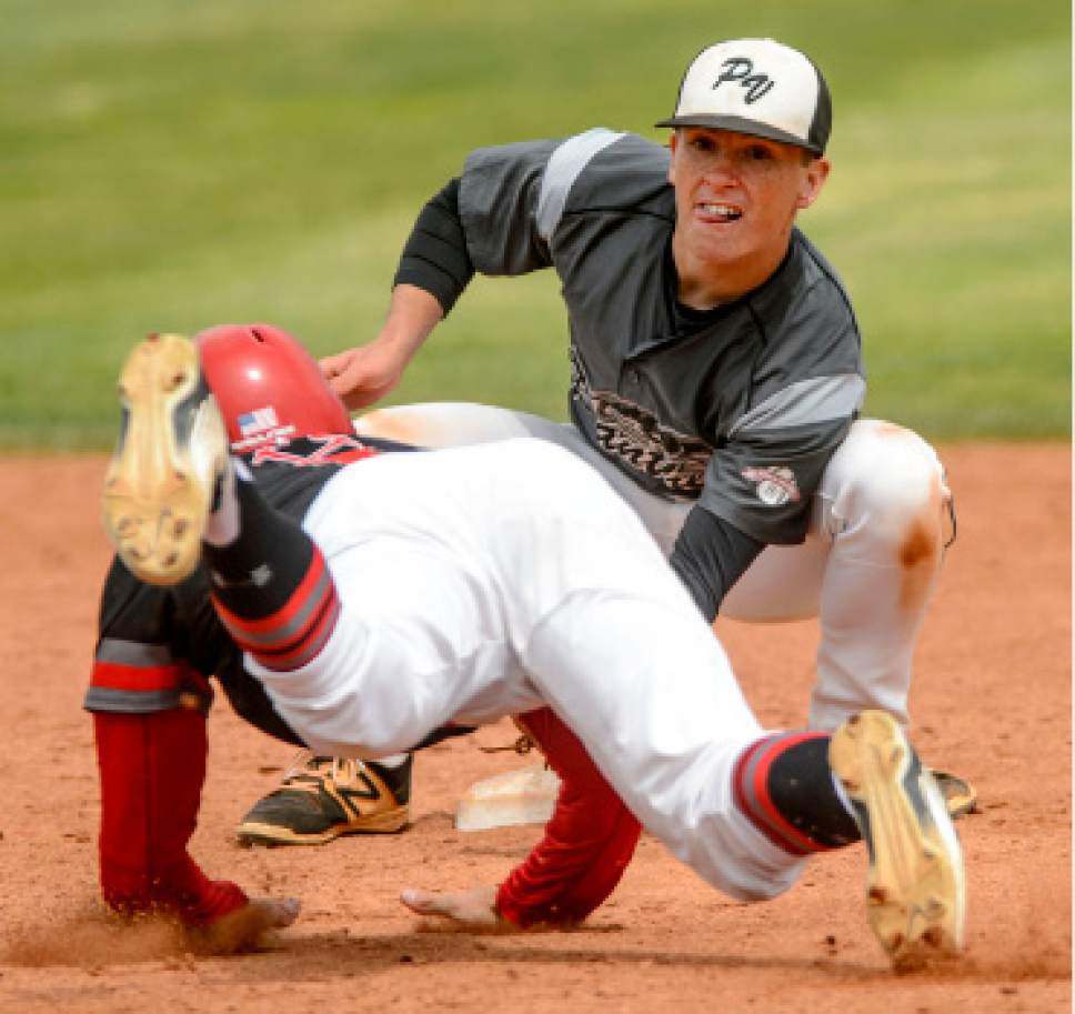 Steve Griffin  |  The Salt Lake Tribune



Pine View second baseman Kory Taigan tags out a Park City runner during the class 3A baseball state playoff game against Park City at UVU in Orem Thursday May 18, 2017.