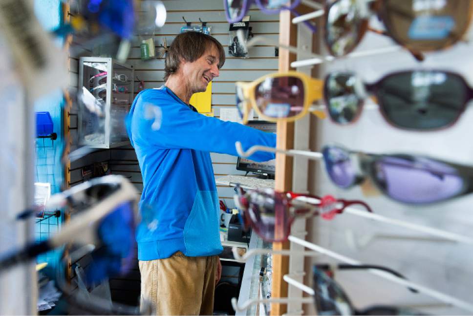 Leah Hogsten  |  The Salt Lake Tribune
Tim Metos shakes the hand of a longtime friend and customer at his small shop in the Avenues that provided custom mountain bikes and Nordic skiing products, Wednesday, May 17, 2017. After 32 years in business, Metos has decided to close the store.