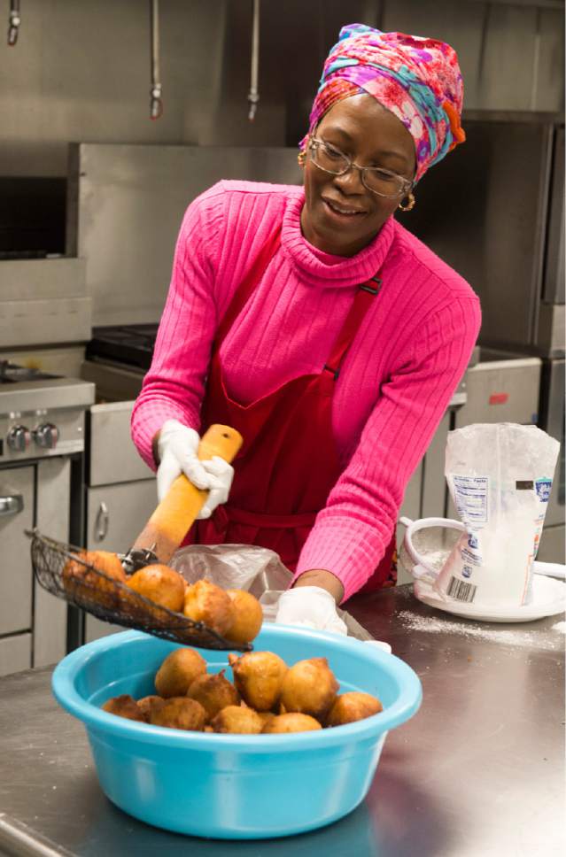 Rick Egan  |  The Salt Lake Tribune

Cathy Tshilombo, owner of Mama Africa Kitoko, seen here in 2015, is one of 17 food vendors at the 2017 Living Traditions Festival in Salt Lake City.