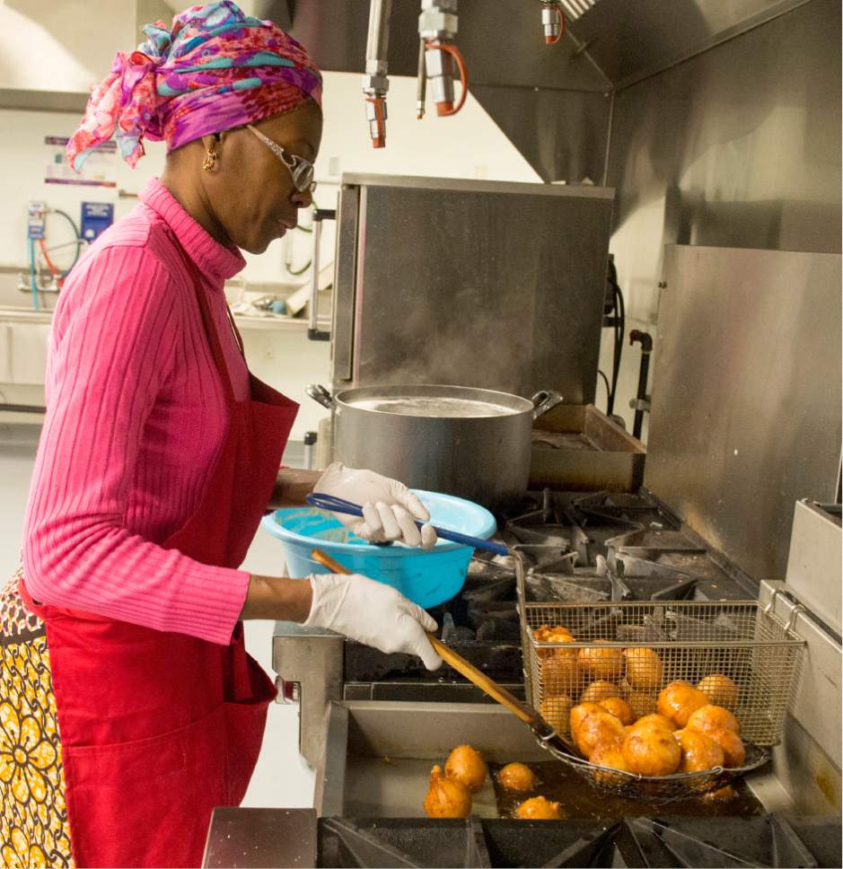 Rick Egan  |  The Salt Lake Tribune

Cathy Tshilombo, owner of Mama Africa Kitoko, seen here in 2015, is one of 17 food vendors at the 2017 Living Traditions Festival in Salt Lake City.