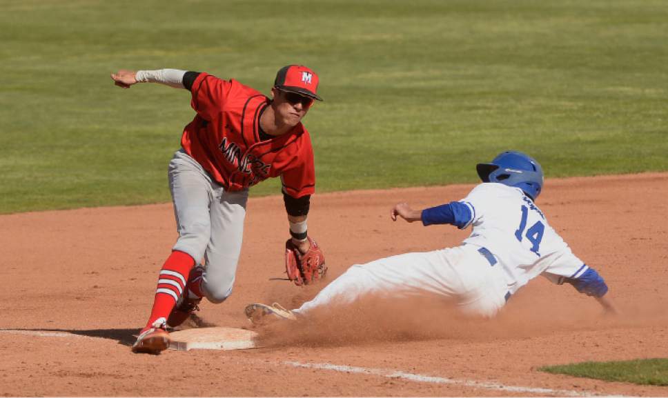 Leah Hogsten  |  The Salt Lake Tribune
Park City's Ryan Brady can't make the tag on Dixie's Kayler Yates. Dixie High School boys' baseball team defeated Park City High School 19-1 during their Class 3A baseball state semifinal at Brent Brown Ballpark, Friday, May 19, 2017.