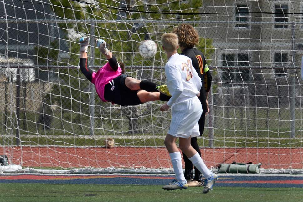 Scott Sommerdorf | The Salt Lake Tribune
Viewmont goalkeeper Tyler Trump has this free kick by Herriman's Carter Johnson get past his wall and him to give Herriman an early 1-0 lead. Herriman and Viewmont were tied 1-1 at the half in a 5a playoff at Herriman, Friday, May 19, 2017.