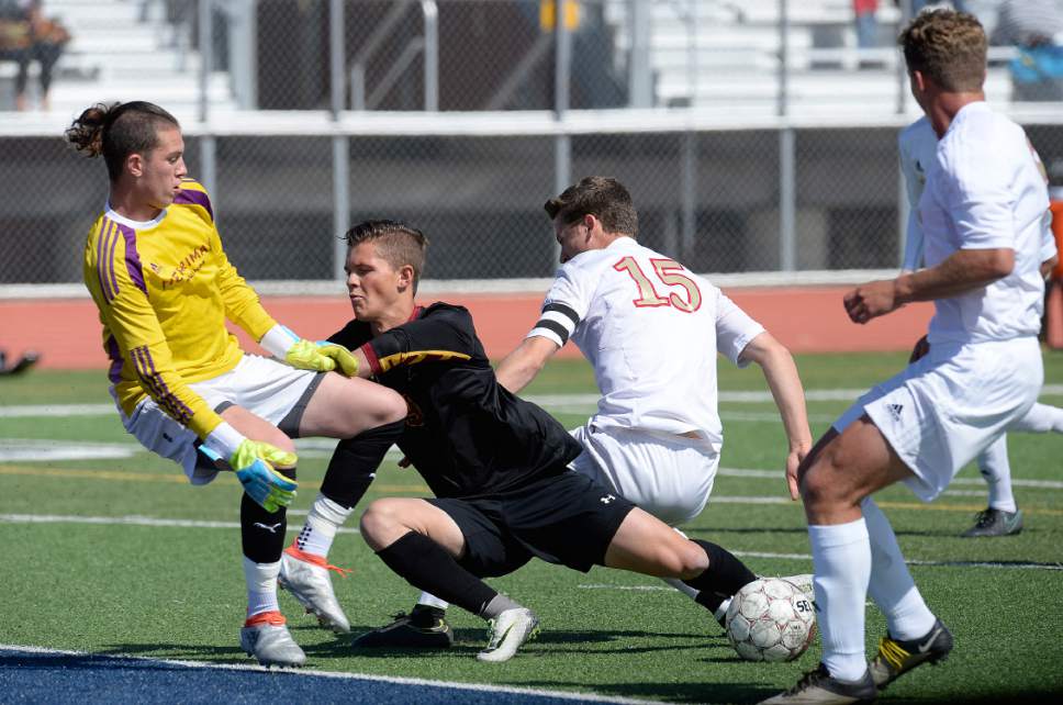 Scott Sommerdorf | The Salt Lake Tribune
The referee made the call that Viewmont's Marshall Johnson was interfered with on this play, setting up Drake Cook Dandos's penalty kick to equalize the score. Herriman and Viewmont were tied 1-1 at the half in a 5a playoff at Herriman, Friday, May 19, 2017.
