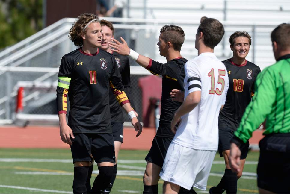 Scott Sommerdorf | The Salt Lake Tribune
Viewmont's Drake Cook Dandos, #11, is calm as his team mates rush over to congratulate him on his successful penalty kick to equalize the score. Herriman and Viewmont were tied 1-1 at the half in a 5a playoff at Herriman, Friday, May 19, 2017.