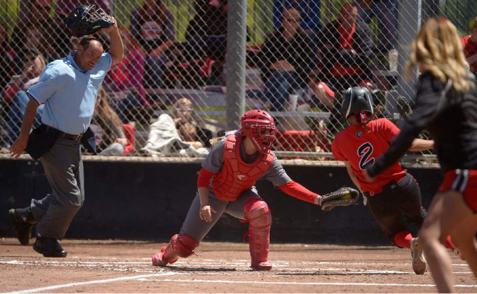 Leah Hogsten  |  The Salt Lake Tribune
Grantsville's Letitia Casper is outed at home by Bear River's catcher Taylor Fox. Grantsville High School girls' softball team defeated Bear River High School 7-4 to win the Class 3A Softball State Championship, Saturday, May 20, 2017.
