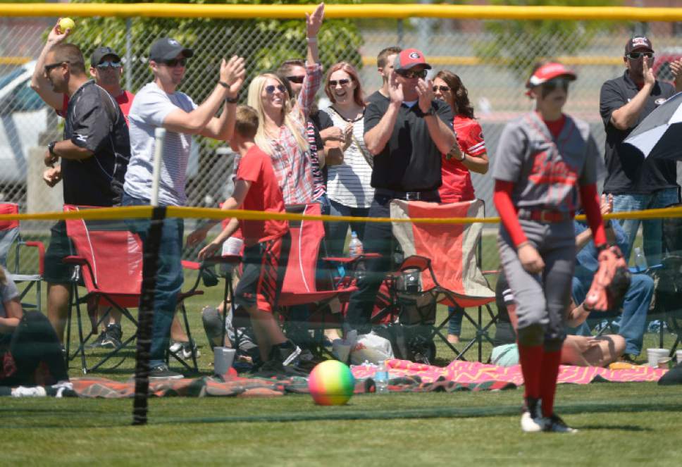 Leah Hogsten  |  The Salt Lake Tribune
Grantsville fans cheer after Hannah Butler's hit sails over the fence for a home run. Grantsville High School girls' softball team defeated Bear River High School 7-4 to win the Class 3A Softball State Championship, Saturday, May 20, 2017.