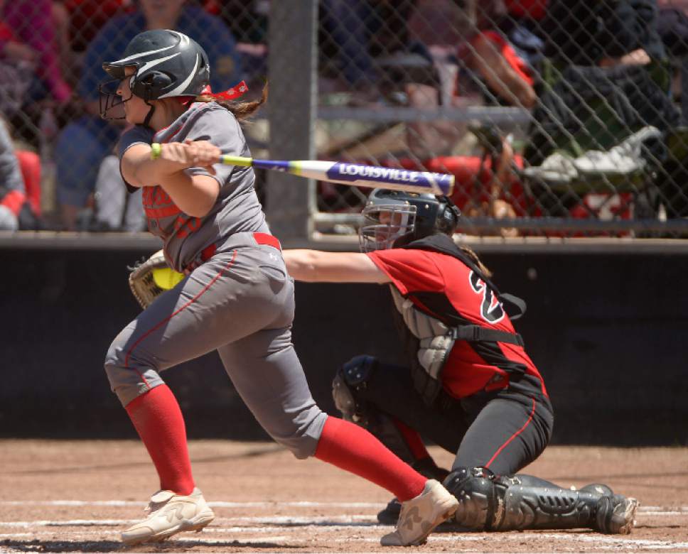 Leah Hogsten  |  The Salt Lake Tribune
Bear River's Taylor Fox is outed by Grantsville pitcher Letitia Casper. Grantsville High School girls' softball team defeated Bear River High School 7-4 to win the Class 3A Softball State Championship, Saturday, May 20, 2017.