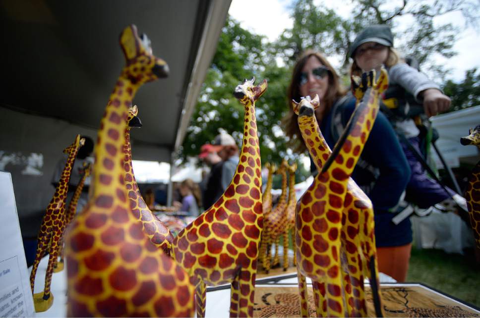 Scott Sommerdorf | The Salt Lake Tribune
Carved giraffes from South Sudanese artists were on display Sunday at the 32nd Living Traditions Festival at Library Square.