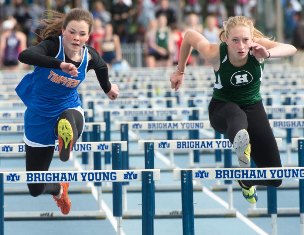 Rick Egan  |  The Salt Lake Tribune

Grace Cobabe, Hillcrest narrowly edges out Lindsey Middleton, Timpview in the Girls 100 Meter Hurdles, in the High School Track and Field State Championships, at Clarence Robison Track in Provo. Friday, May 19, 2017.