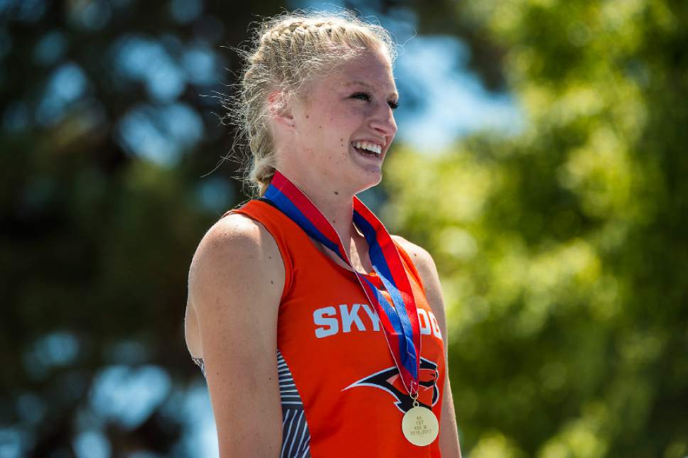 Chris Detrick  |  The Salt Lake Tribune
Skyridge's Brinn Jensen poses for photos after winning the 4A Girl's 400 Meter race during the state track meet at Brigham Young University Saturday, May 20, 2017. Jensen won with a time of 55.95.