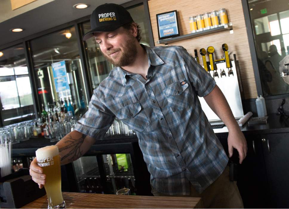 Leah Hogsten  |  The Salt Lake Tribune 
Proper Brewing Company brewer Rio Connelly pours a Lake Effect Zeipziger Gose Ale. Proper Brewing Co., located at 857 Main St. in Salt Lake City, is one of nine breweries within a six-mile stretch.