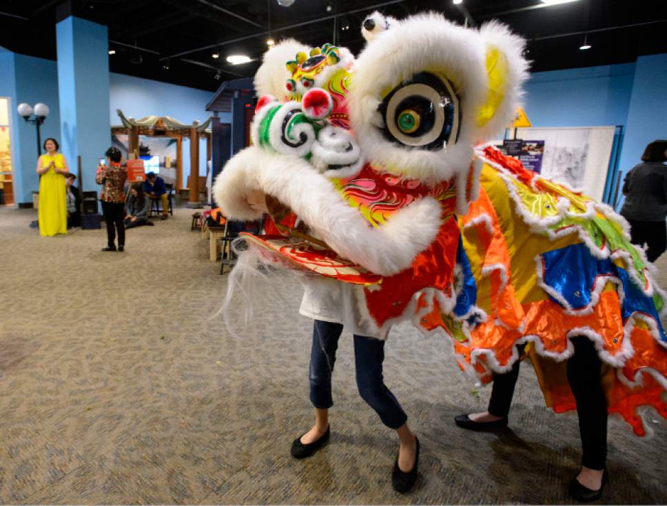 Steve Griffin  |  The Salt Lake Tribune



Marym Sreaman and Jaci Huo, fifth-graders in Calvin Smith Elementary school's Chinese Dual Immersion classes, perform the Lion Dance during the opening of Discovery Gateway's newest exhibit, "Children of Hangzhou: Connecting with China" in Salt Lake City Friday May 19, 2017.