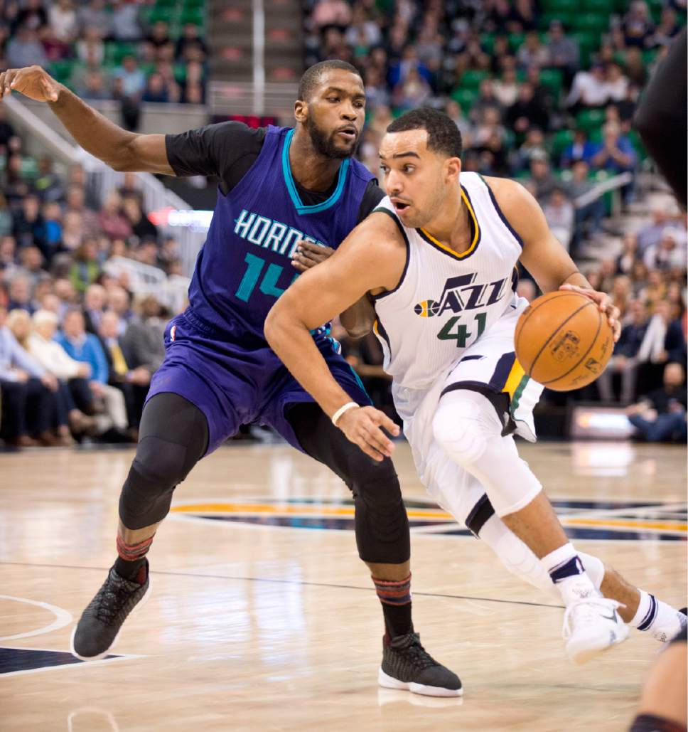 Lennie Mahler  |  The Salt Lake Tribune

Trey Lyles drives past Charlotte's Michael Kidd-Gilchrist in a game at Vivint Smart Home Arena on Saturday, Feb. 4, 2017.