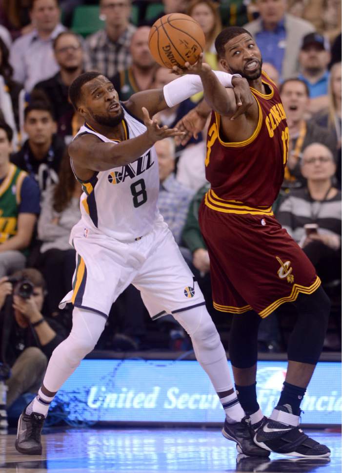 Steve Griffin / The Salt Lake Tribune

Utah Jazz guard Shelvin Mack (8) and Cleveland Cavaliers center Tristan Thompson (13) reach for the ball during the Utah Jazz versus Cleveland Cavaliers NBA basketball game at Vivint Smart Home Arena in Salt Lake City Tuesday January 10, 2017.