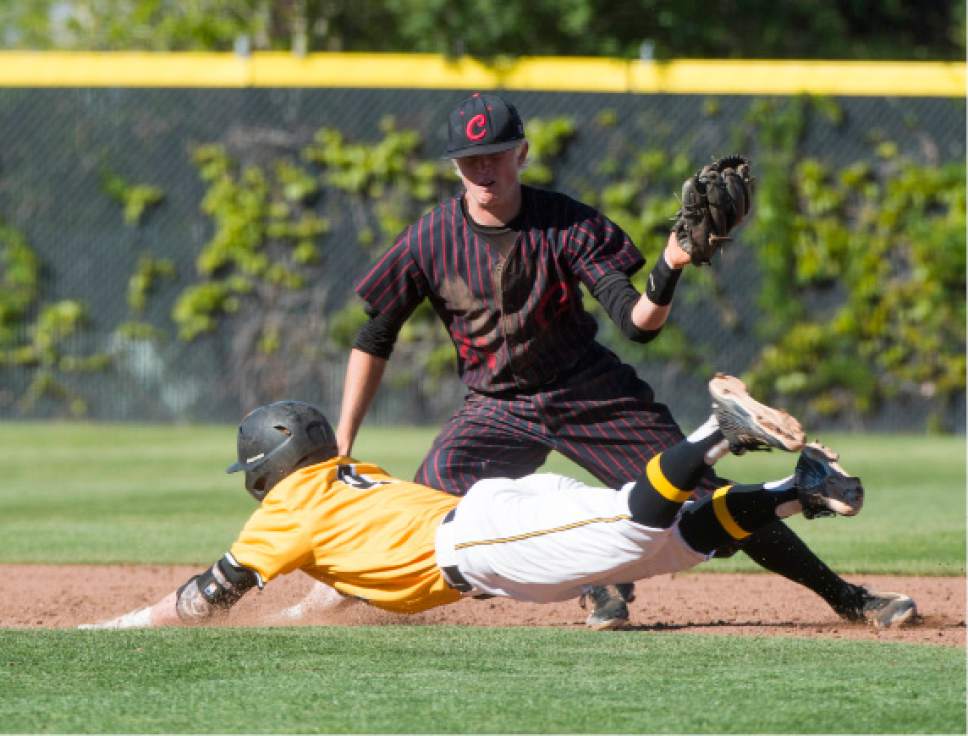 Rick Egan  |  The Salt Lake Tribune


Caleb Manuel (4) Cottonwood, slides safely into second base, as American Fork short-stop Ryan Hardman (21) grabs the throw, in the 5A baseball quarterfinal between American Fork and Cottonwood in Kearns, Tuesday, May 23, 2017.
