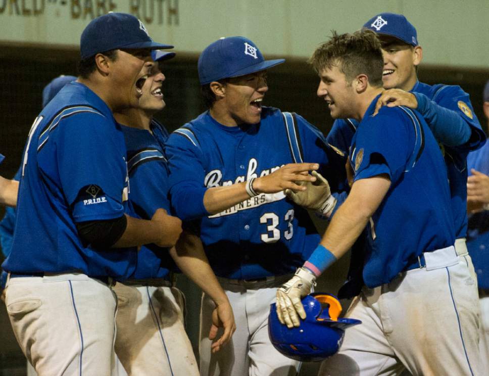 Rick Egan  |  The Salt Lake Tribune

Bingham celebrates after Copper Hansen knocked in 3 runs in the 7th, giving the Miners a 14-13 lead, in the 5A baseball quarterfinal between Lone Peak and Bingham, in Kearns, Tuesday, May 23, 2017.