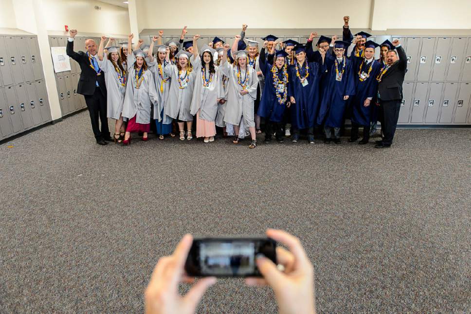 Trent Nelson  |  The Salt Lake Tribune
The graduating class at Water Canyon High School poses for a photo before their graduation ceremony in Hildale, Monday May 22, 2017. Two years ago the school had one graduate, this year twenty-five.