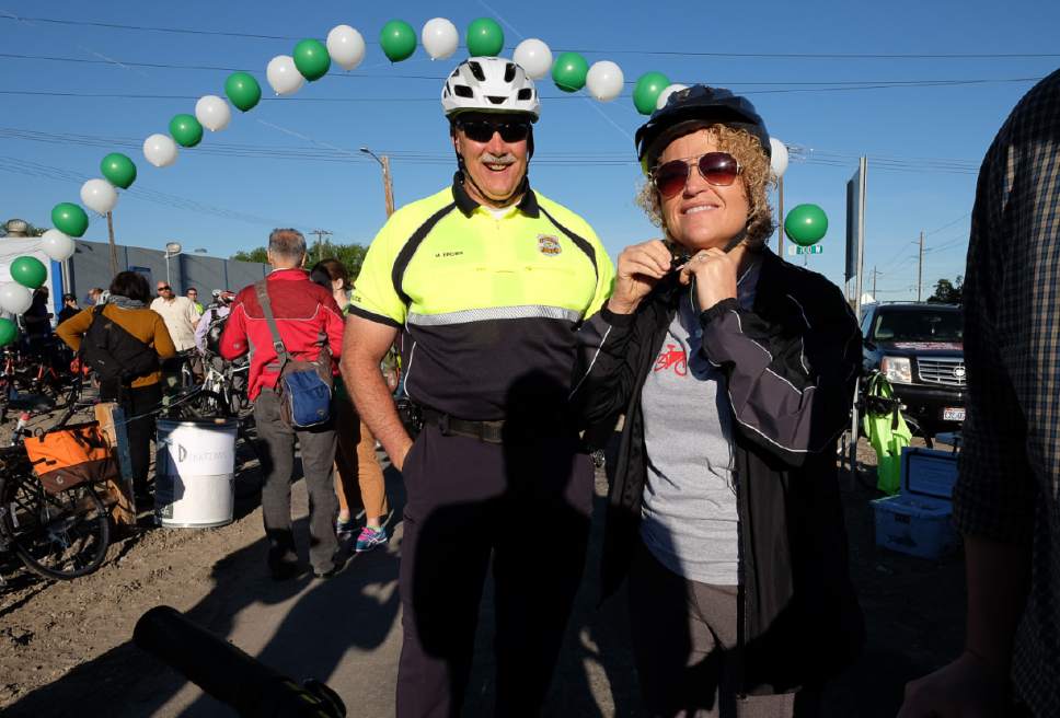 Francisco Kjolseth | The Salt Lake Tribune
Salt Lake City Mayor Jackie Biskupski gets ready to take a fun ride alongside Salt Lake Police Chief Mike Brown for Bike to Work Day on Tuesday, May 23, 2017, to highlight the City's newly constructed 900 South Bike Park at 905 South, 700 West. The ride was meant to promote fitness, clean air, community building, bike safety and celebration of the new bike park as they rode to the City County Building.