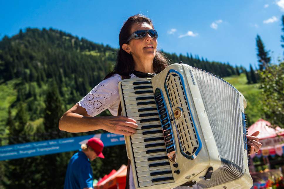 Chris Detrick  |  The Salt Lake Tribune
Yvonne Mueller, of Draper, plays the accordion during Snowbird's 42nd Annual Oktoberfest Celebration Saturday August 16, 2014.