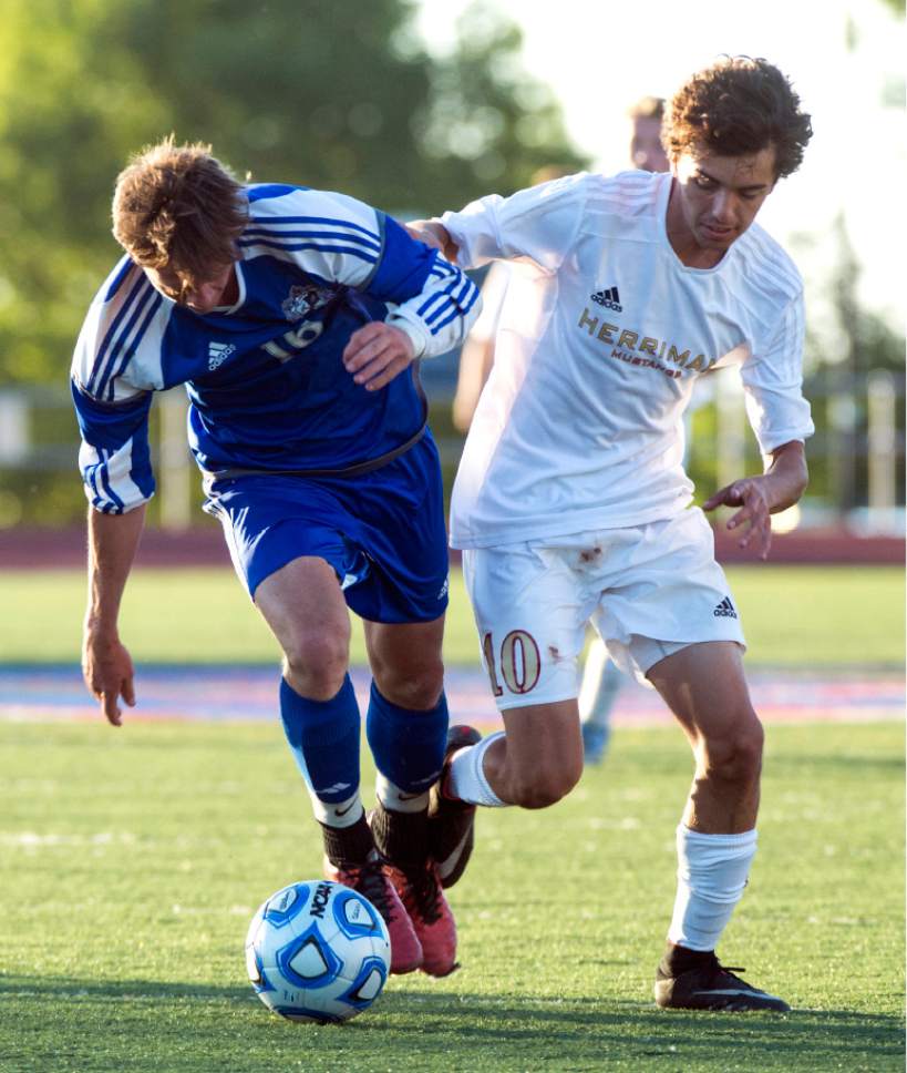 Rick Egan  |  The Salt Lake Tribune

Nathan Devenberg (16) Bingham, goes for the ball along with Nick Franco (10)Herriman, in prep soccer action, 5A boys' state semifinal between Herriman and Bingham, in Woods Cross, Tuesday, May 23, 2017.