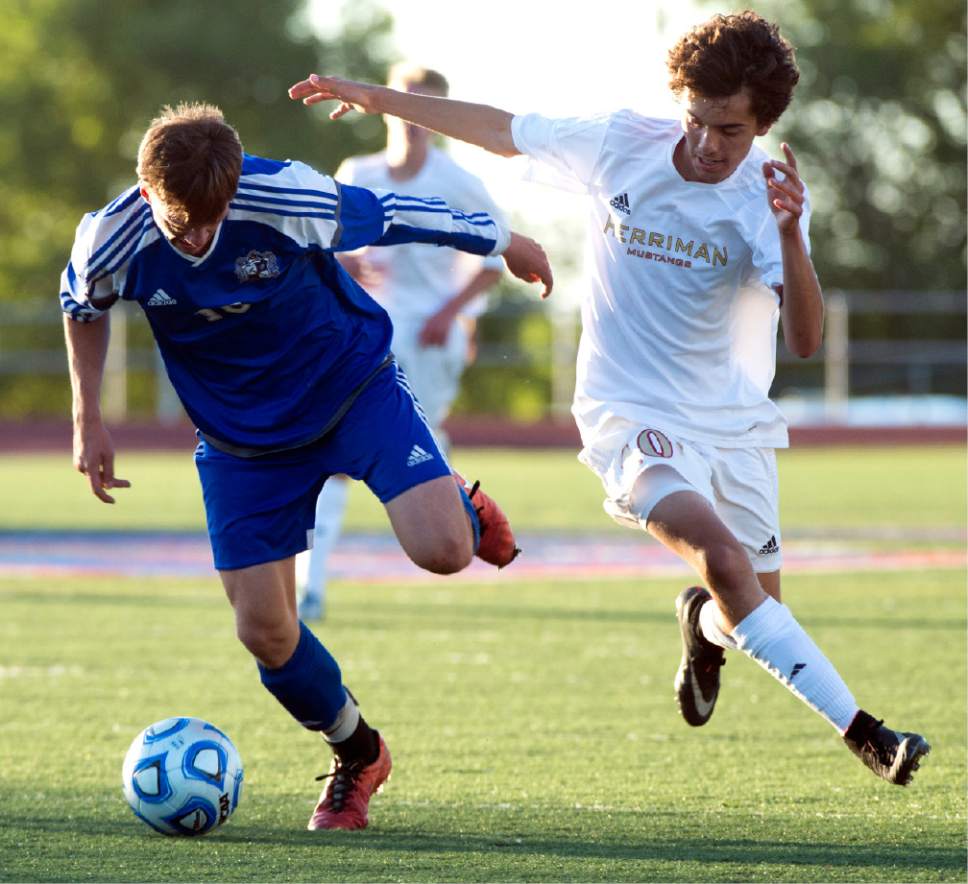 Rick Egan  |  The Salt Lake Tribune

Nathan Devenberg (16) Bingham, goes for the ball along with Nick Franco (10)Herriman, in prep soccer action, 5A boys' state semifinal between Herriman and Bingham, in Kaysville, Tuesday, May 23, 2017.