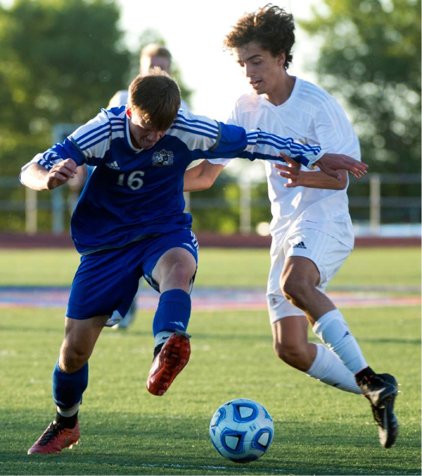 Rick Egan  |  The Salt Lake Tribune

Nathan Devenberg (16) Bingham, goes for the ball along with Nick Franco (10)Herriman, in prep soccer action, 5A boys' state semifinal between Herriman and Bingham, in Woods Cross, Tuesday, May 23, 2017.