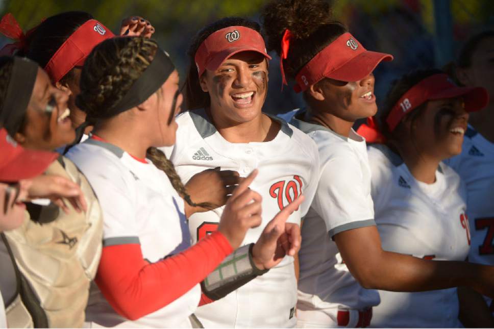 Leah Hogsten  |  The Salt Lake Tribune
West celebrates the win. West High School girls' softball team defeated Syracuse High School 12-0 in five innings to win the quarterfinal game in the Class 5A Softball State playoff tournament at Valley Softball Complex, Tuesday, May 23, 2017.