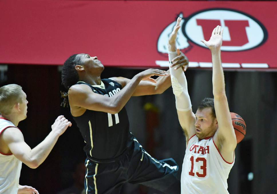 Lennie Mahler  |  The Salt Lake Tribune

Utah forward David Collette is whistled for a foul as Colorado's Xavier Johnson drives the ball in the second half of a game against the Colorado Buffaloes on Sunday, Jan. 1, 2017, at the Huntsman Center in Salt Lake City.