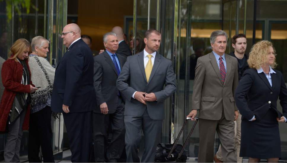 Leah Hogsten  |  The Salt Lake Tribune
Prosecutors and Millard County Sheriff's Deputies walk out of U.S. Courthouse for the District of Utah after Roberto Miramontes Roman was sentenced to life, plus 80 years without parole for fatally shooting Millard County sheriff's Deputy Josie Greathouse Fox during a 2010 traffic stop. A jury convicted Roman in February of eight charges, including intentionally killing a local law enforcement officer engaged in the performance of official duties and using a firearm during a crime of violence.