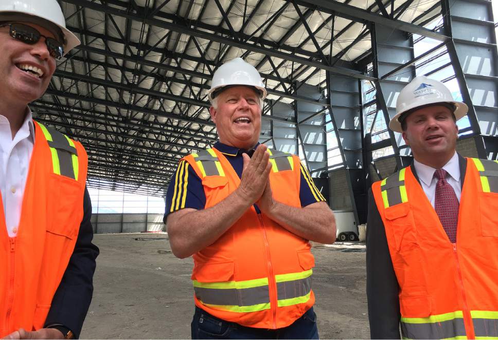 Scott Sommerdorf | The Salt Lake Tribune
RSL owner Dell Loy Hansen, center, describes the covered Zions Bank Training Center during a tour of RSL's Herriman soccer complex, Wednesday, May 24, 2017.