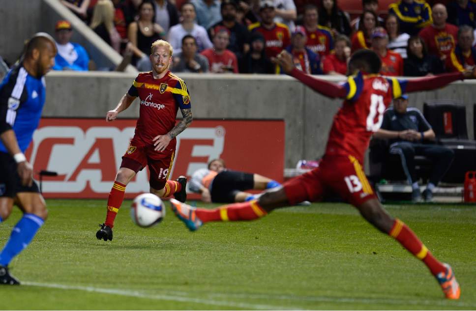 Scott Sommerdorf   |  The Salt Lake Tribune
Real Salt Lake midfielder Luke Mulholland (19) watches as Real Salt Lake forward Olmes Garcia (13) stretches for a ball during first half play. The San Jose Earthquakes led Real Salt Lake 1-0 at the half, Friday, May 1, 2015.