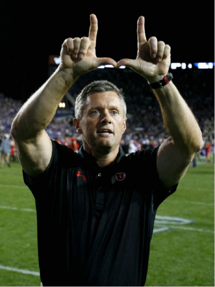 Trent Nelson  |  The Salt Lake Tribune
Utah Utes head coach Kyle Whittingham celebrates the win as the BYU Cougars host the Utah Utes, college football Saturday, September 21, 2013 at LaVell Edwards Stadium in Provo.