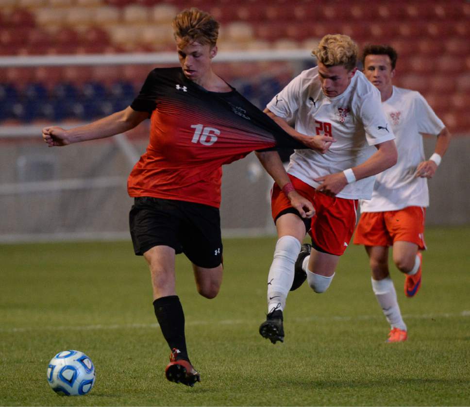 Francisco Kjolseth | The Salt Lake Tribune
Alta's Alec Groathouse has his shirt pulled by Scott Hulbert (29) of East before Alta's 1-0 win over East in 4A boys' state soccer championship at Rio Tinto Stadium, Thursday, May 25, 2017.