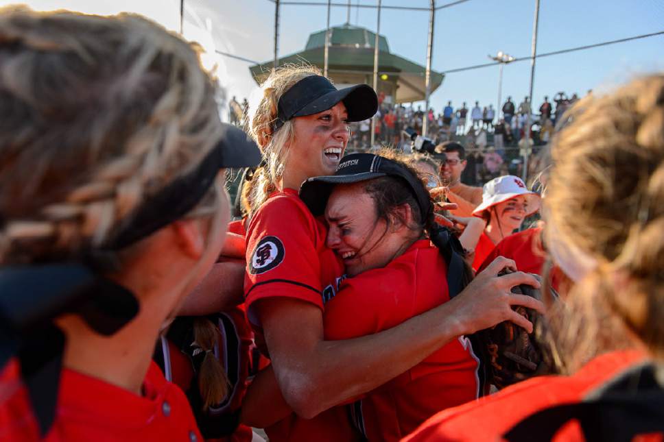 Trent Nelson  |  The Salt Lake Tribune
Spanish Fork's Cambrie Hazel, left, is embraced by teammate Gabby Beckstrom as Spanish Fork defeats Uintah High School in the Class 4A softball state title game in Taylorsville, Thursday May 25, 2017.