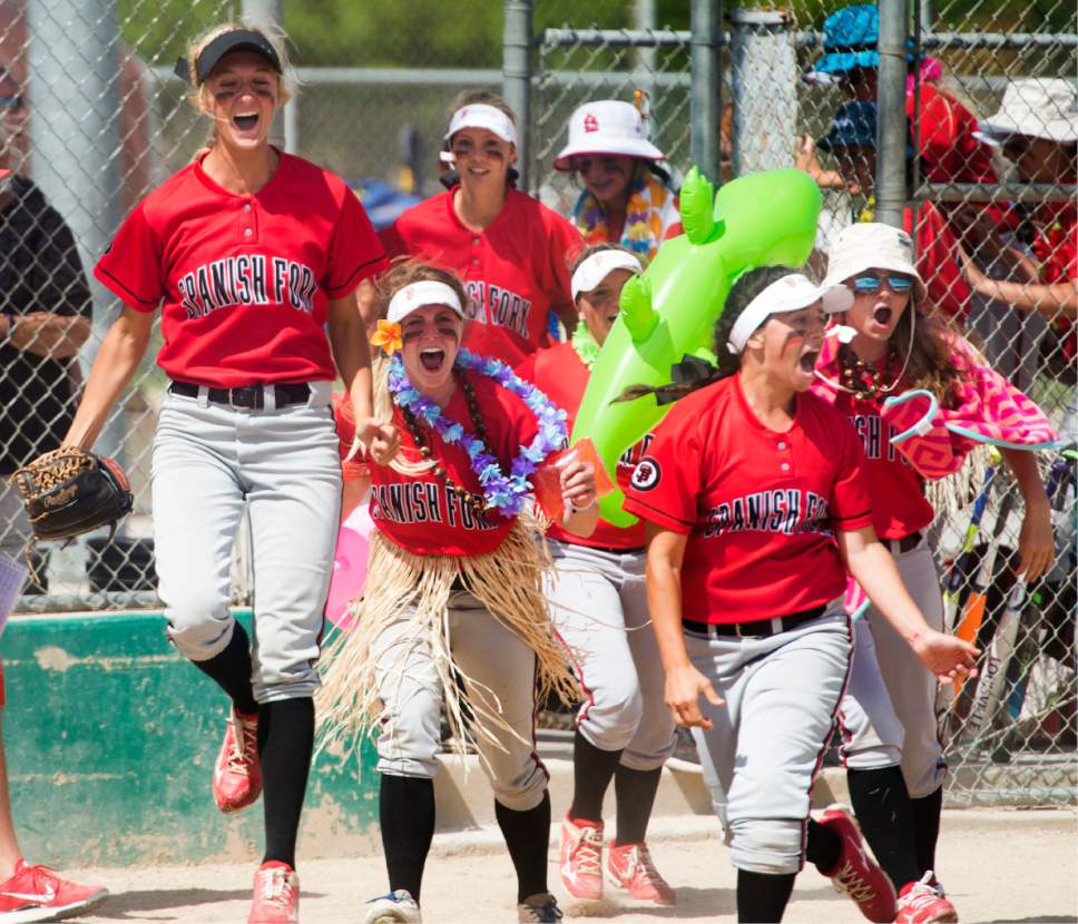 Rick Egan  |  The Salt Lake Tribune

Spanish Fork celebrates a home run by Brylee Rudd (10) in the 4A softball state title game between Spanish Fork and Uintah, in Taylorsville, Thursday, May 25, 2017.