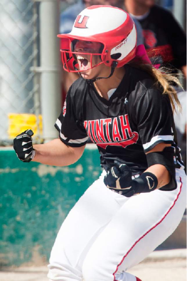 Rick Egan  |  The Salt Lake Tribune

Summer Stensgard celebrates her 3rd home run of the game, in the 4A softball state game between Spanish Fork and Uintah, in Taylorsville, Thursday, May 25, 2017.