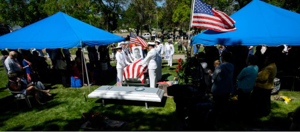 Steve Griffin  |  The Salt Lake Tribune



The Navy Honor Guard removes the casket of Elliott Deen Larsen whose remains finally came home to the Monroe City Cemetery in Monroe, Utah  Friday May 26, 2017. Larsen's family recently learned that he died on the USS Oklahoma at Pearl Harbor.
