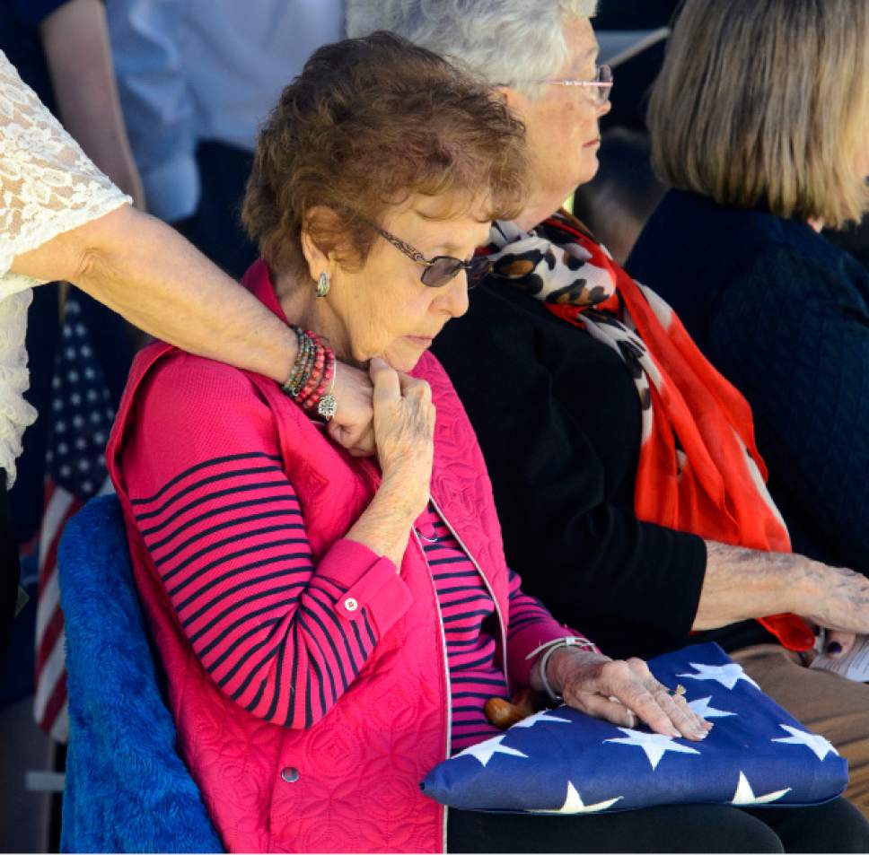Steve Griffin  |  The Salt Lake Tribune


Betty Lou Worley is comforted after receiving the American Flag that covered her brother Elliott Deen Larsen's casket whose remains finally came home to the Monroe City Cemetery in Monroe, Utah  Friday May 26, 2017. Larsen's family recently learned that he died on the USS Oklahoma at Pearl Harbor.