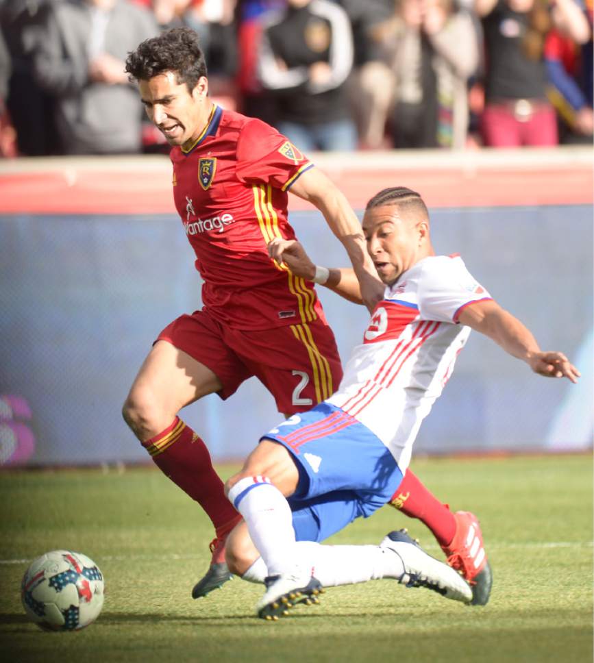 Leah Hogsten  |  The Salt Lake Tribune
Real Salt Lake defender Tony Beltran (2) and Toronto FC defender Justin Morrow (2) fight to get to the ball. Real Salt Lake tied the 2017 season home opener with Toronto FC, 0-0, Saturday, March 4, 2017 at Rio Tinto Stadium.