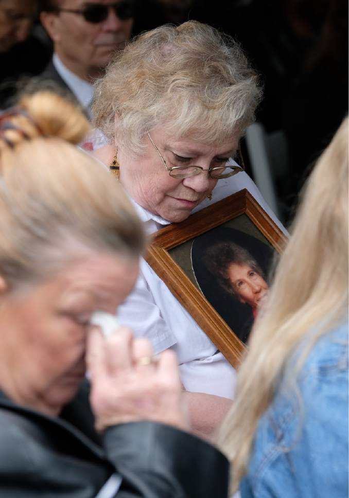 Francisco Kjolseth | The Salt Lake Tribune
Christie Evans, 71, holds a picture of her mother, Norma Kjelstrom who died Dec. 7 at the age of 90 and who donated her body to the University of Utah Medical School.  On Friday, May 26, 2017, a service was held at the Salt Lake City Cemetery for all of the bodies donated to science that helped medical students at the University of Utah learn to become doctors. The service honored 241 individuals who gave their bodies to science and education at the University last year.