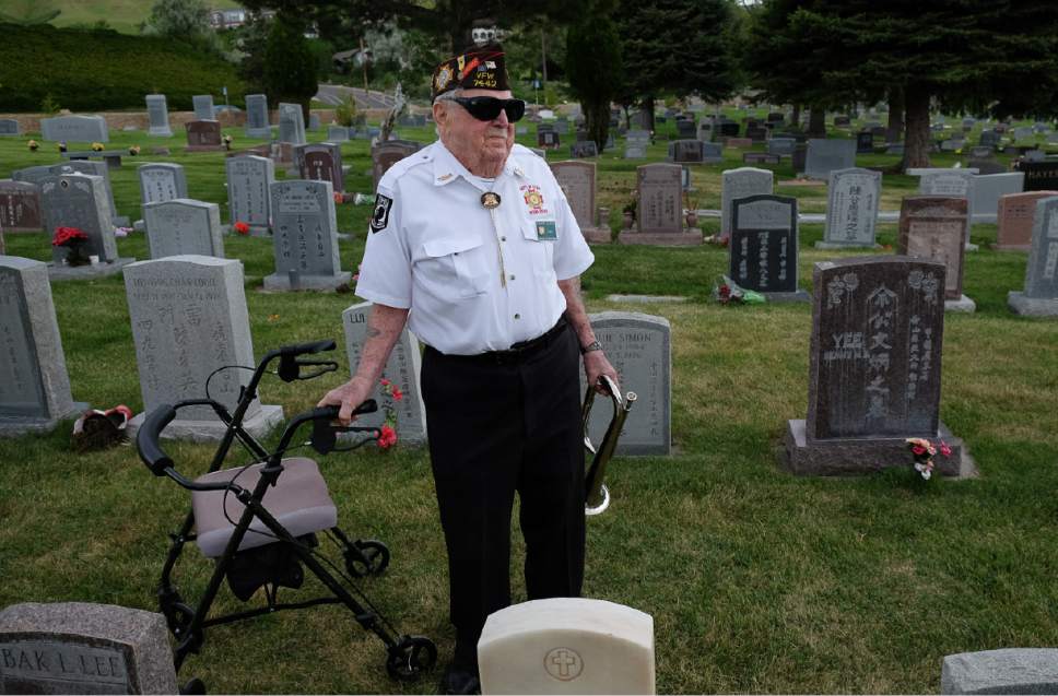 Francisco Kjolseth | The Salt Lake Tribune
WWII and Korean War veteran Bob Engstrum, 89,  a member of the VFW District 2 gets ready to play taps as the University of Utah Medical School holds a memorial service at the Salt Lake City Cemetery for all of the bodies donated to science that helped medical students learn to become doctors. The service honored 241 individuals who gave their bodies to science and education at the University last year.