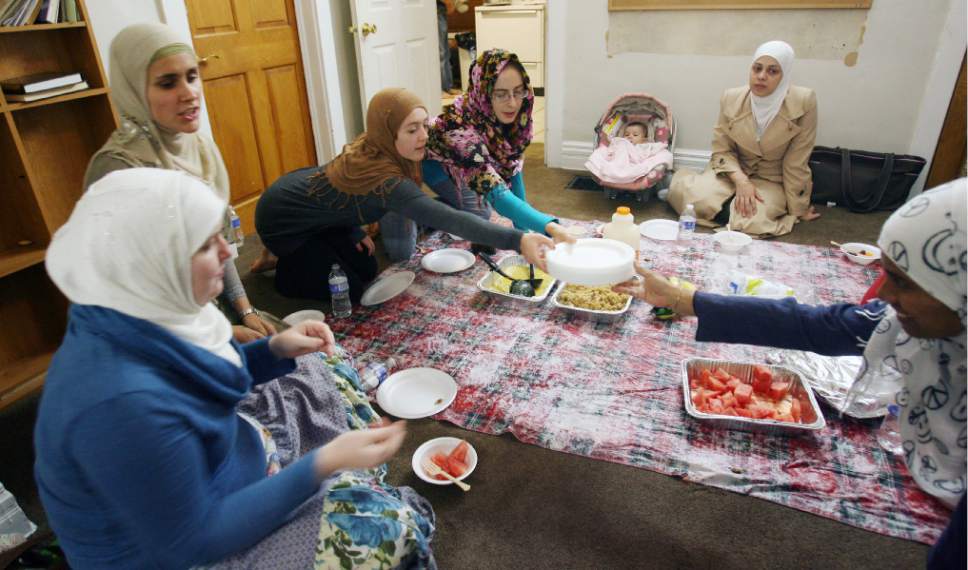 Steve Griffin  |  Tribune file photo
Women prepare for an evening meal at the mosque on 700 East near 700 South in Salt Lake City on Tuesday, Aug. 7, 2012.  Many Muslim members of the community gather at the mosque to pray and eat a meal as part of the typical weekday break-the-fast for Ramadan. Two Salt Lake City Mormon wards plan to host area Muslims for such an iftar meal on June 4, 2017.