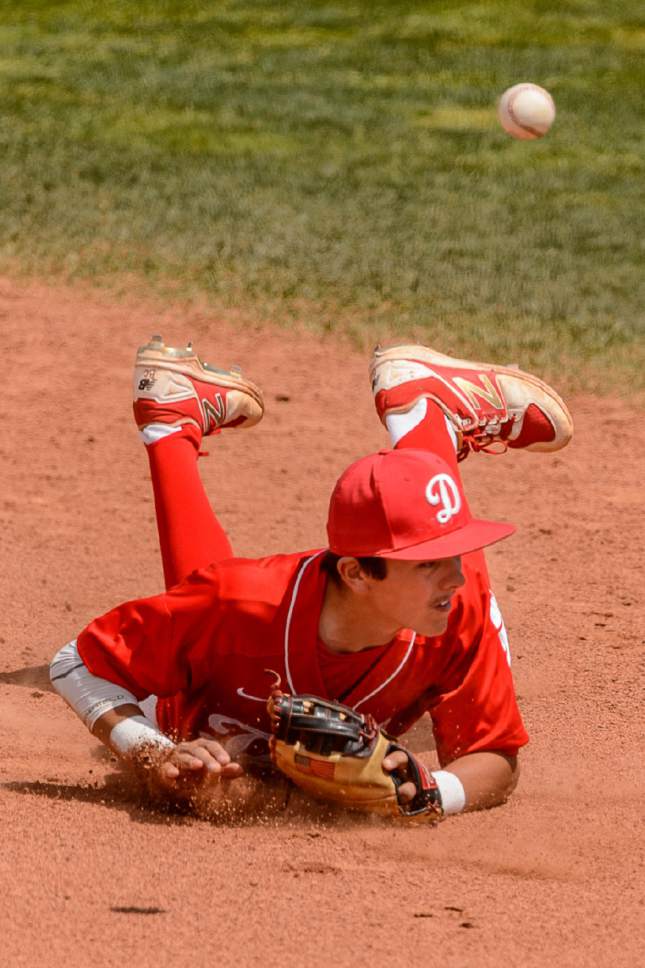Trent Nelson  |  The Salt Lake Tribune
Spanish Fork's Andrew Pintar fields the ball as Spanish Fork faces Timpanogos High School in the Class 4A baseball state title game in Orem, Friday May 26, 2017.