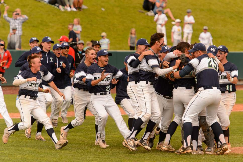 Trent Nelson  |  The Salt Lake Tribune
Timpanogos players celebrate their win over Spanish Fork High School in the Class 4A baseball state title game in Orem, Friday May 26, 2017.
