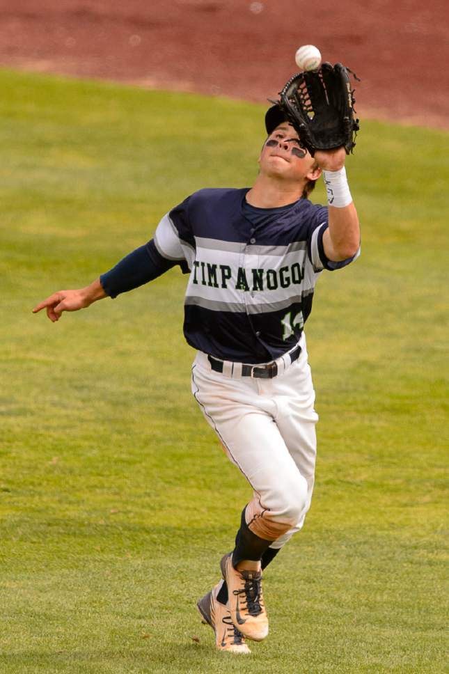 Trent Nelson  |  The Salt Lake Tribune
Timpanogos's Josh Edmonds makes a catch on the run as Spanish Fork faces Timpanogos High School in the Class 4A baseball state title game in Orem, Friday May 26, 2017.