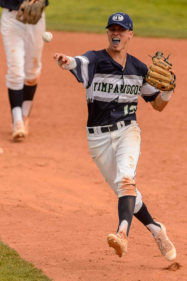 Trent Nelson  |  The Salt Lake Tribune
Timpanogos's Conner Halford throws the ball as Spanish Fork faces Timpanogos High School in the Class 4A baseball state title game in Orem, Friday May 26, 2017.