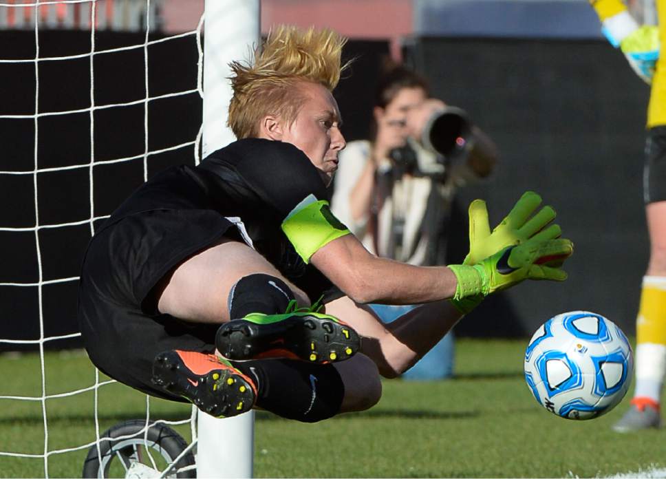Francisco Kjolseth | The Salt Lake Tribune
Layton goal keeper Sam Hunter blocks the shot in shootout against Herriman that tips the win in their favor 5-3 during the 5A boys' state soccer championship  at Rio Tinto Stadium, Thursday, May 25, 2017.